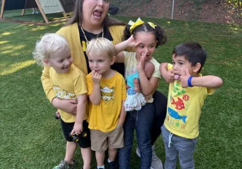 teacher students yellow